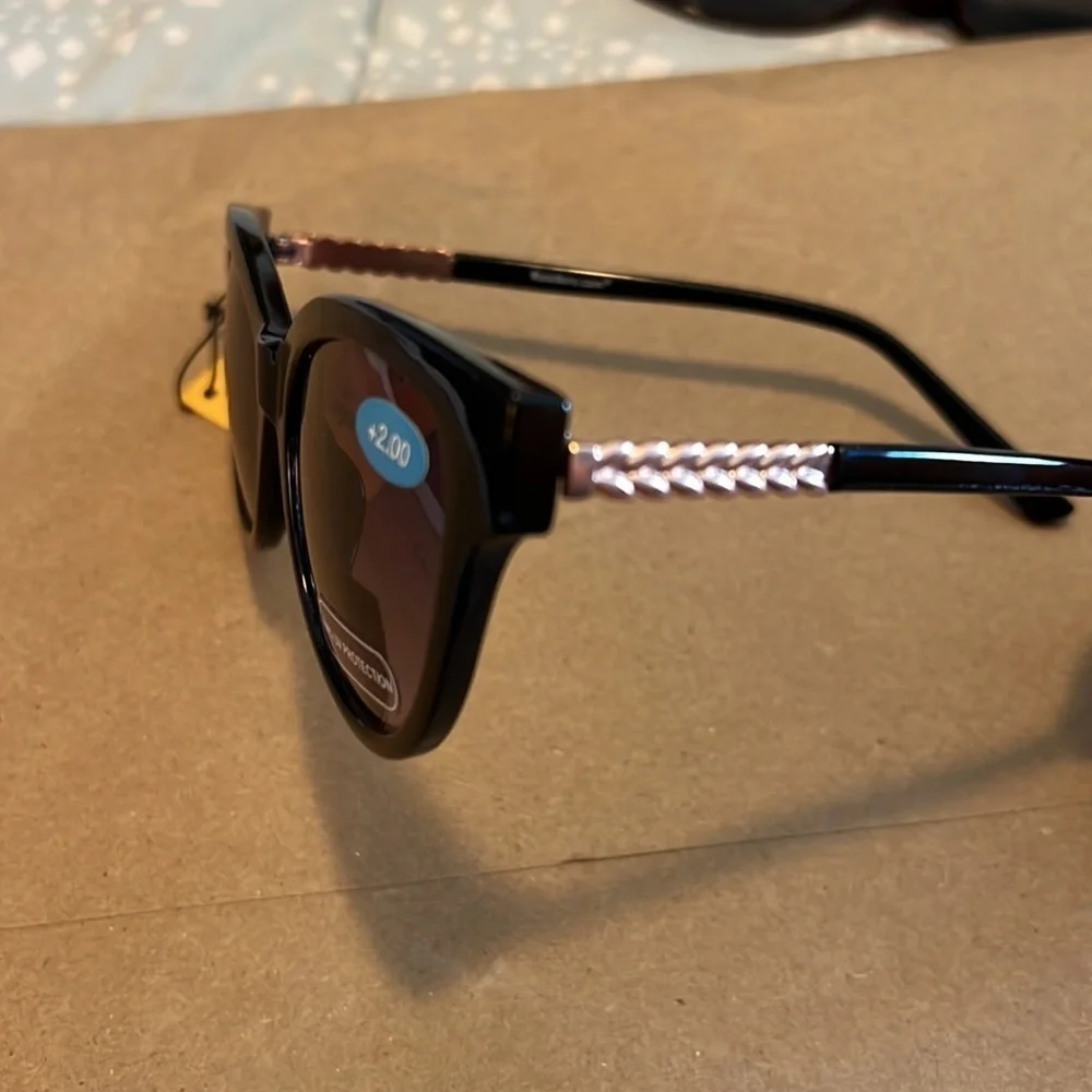 Readers.com bifocal sunglasses. 2.00. Black with rose gold accents.
